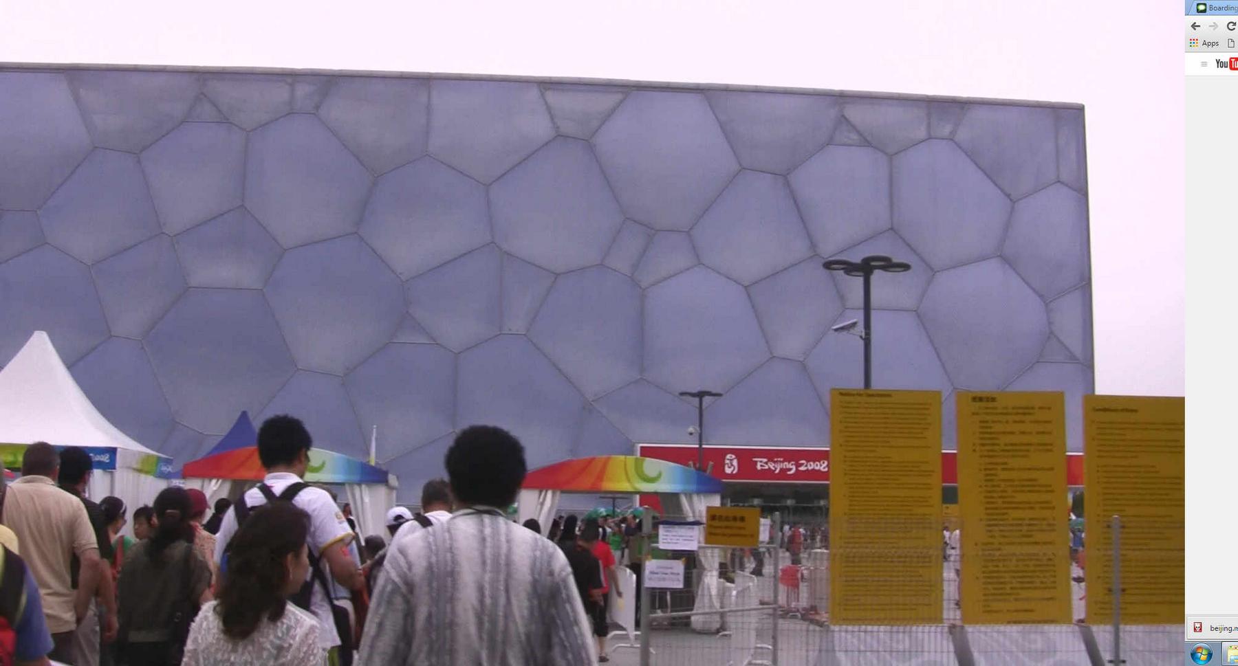 The Beijing Water Cube with crowds gathered outside during the 2008 Olympics.