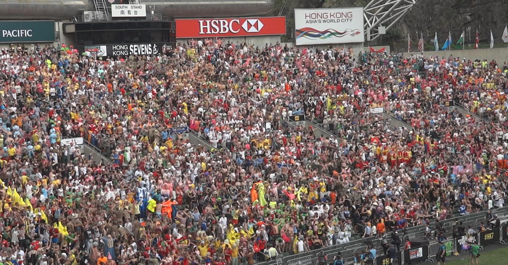 A massive, costumed crowd fills the South Stand at the Hong Kong Rugby Sevens.