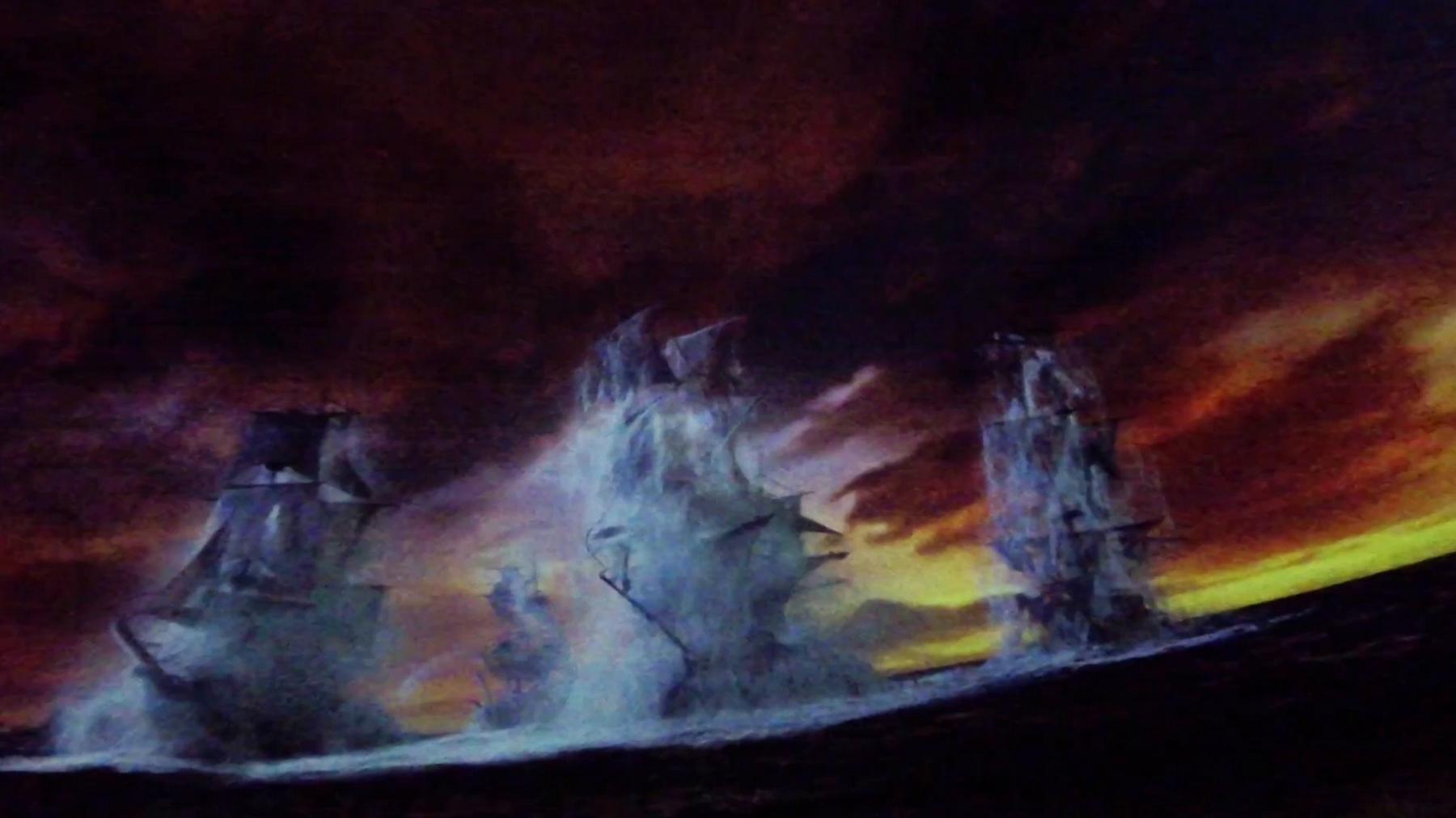 A dramatic scene from the Pirates of the Caribbean ride showing ships battling a stormy sea under a fiery sky.