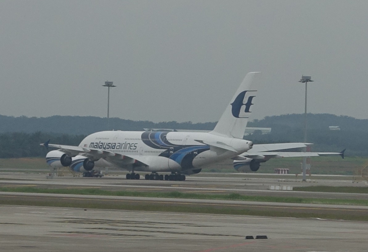 A Malaysia Airlines A380 aircraft is seen on an airport tarmac.