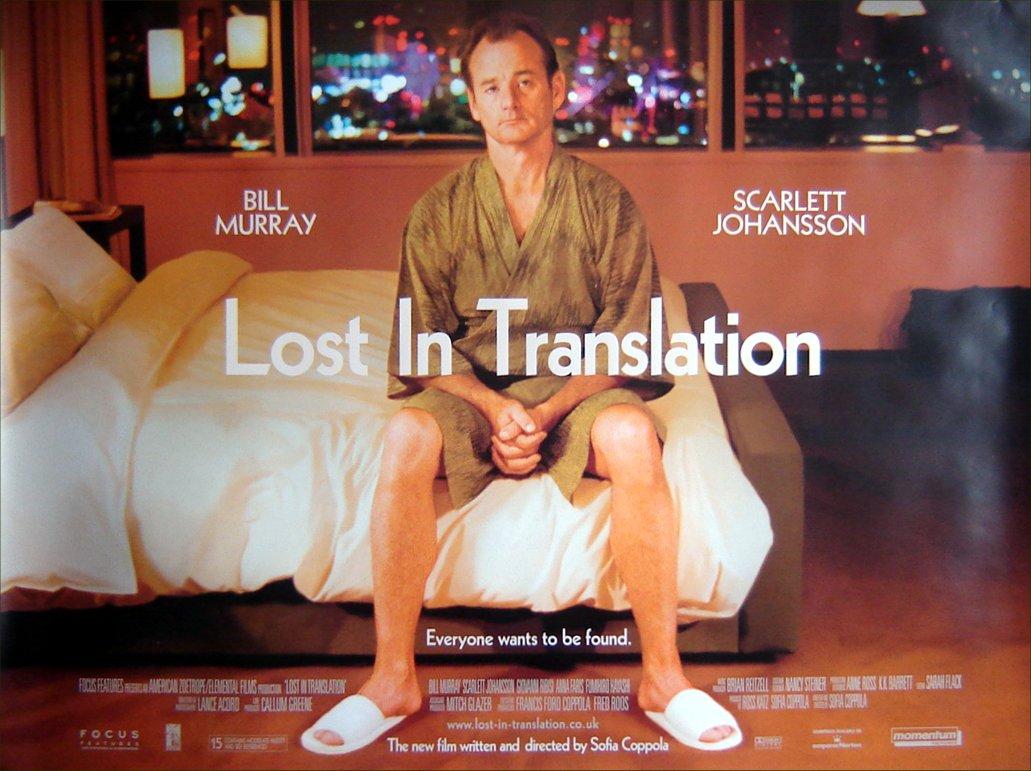 Movie poster for Lost In Translation with Bill Murray sitting in a robe on a bed.
