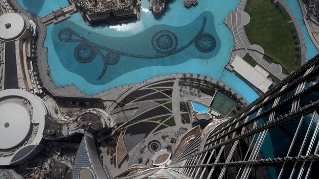 View from the Burj Khalifa looking down at the Dubai Fountains and surrounding area.