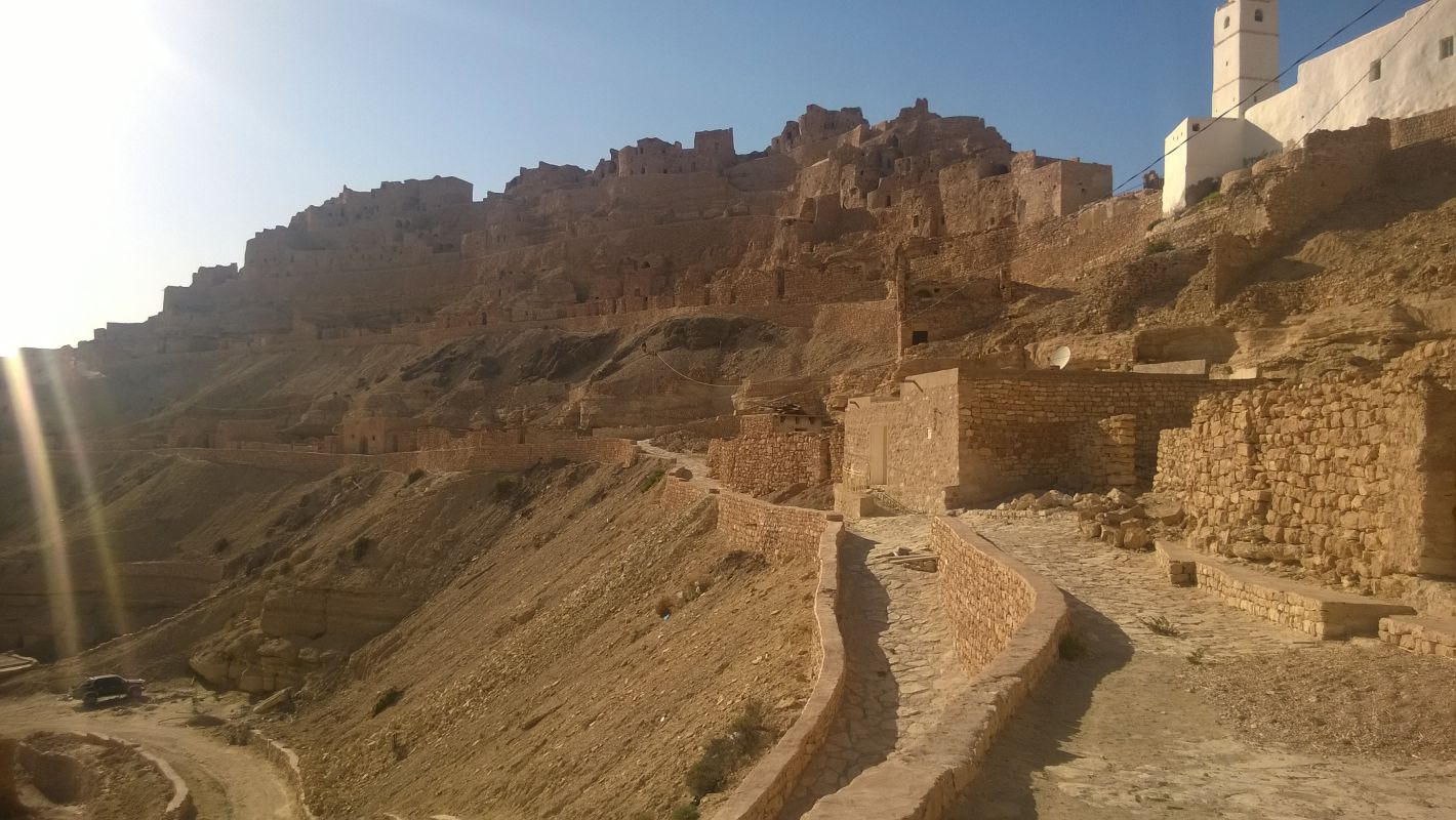 A historic stone village built into a rocky desert hillside in Tunisia, an original Star Wars set.