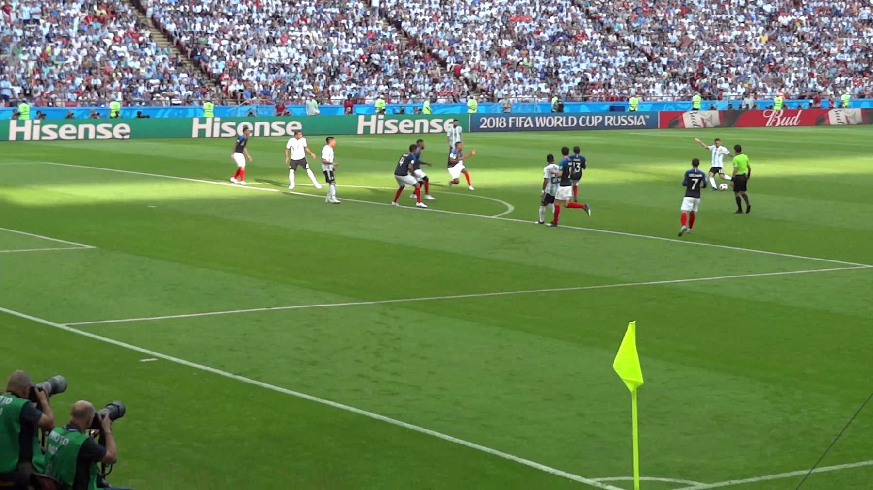 Players from Argentina and France compete on the field during their 2018 World Cup match.